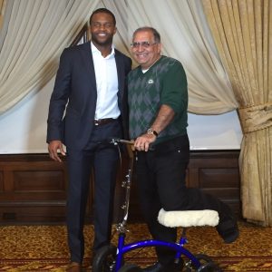 Dr. Ahuja at Sharp Literacy with Packer Randall Cobb