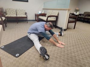 Ballistic Stretch: Seated InnerThigh/Hamstring “V” Reach