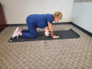 Dynamic Stretch: Thoracic Rotational Reach Through